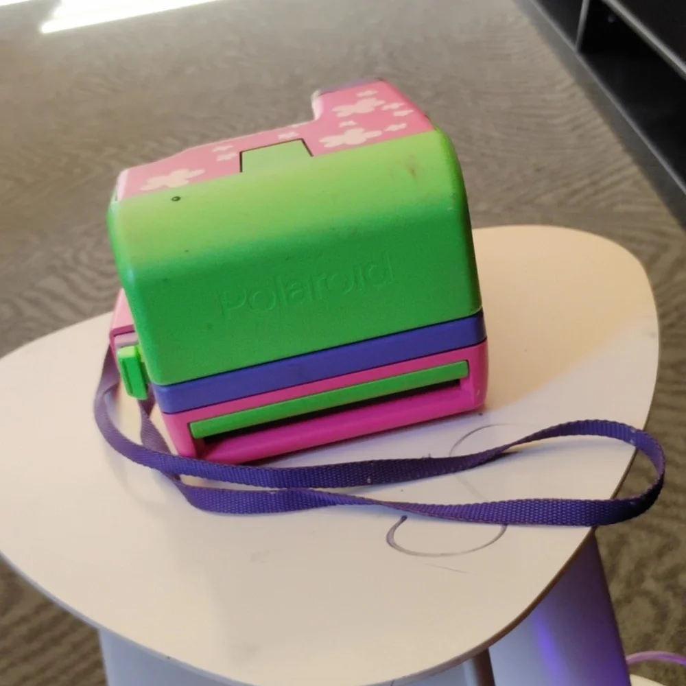 90s polaroid Barbie's camera